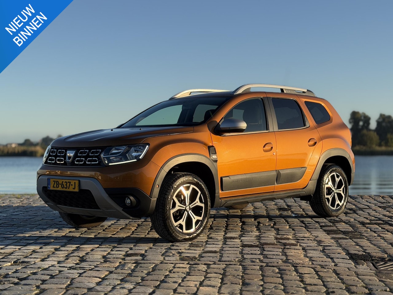 Dacia Duster - 1.6 SCe Prestige LPG *Nieuwstaat* Keyless|Clima - AutoWereld.nl