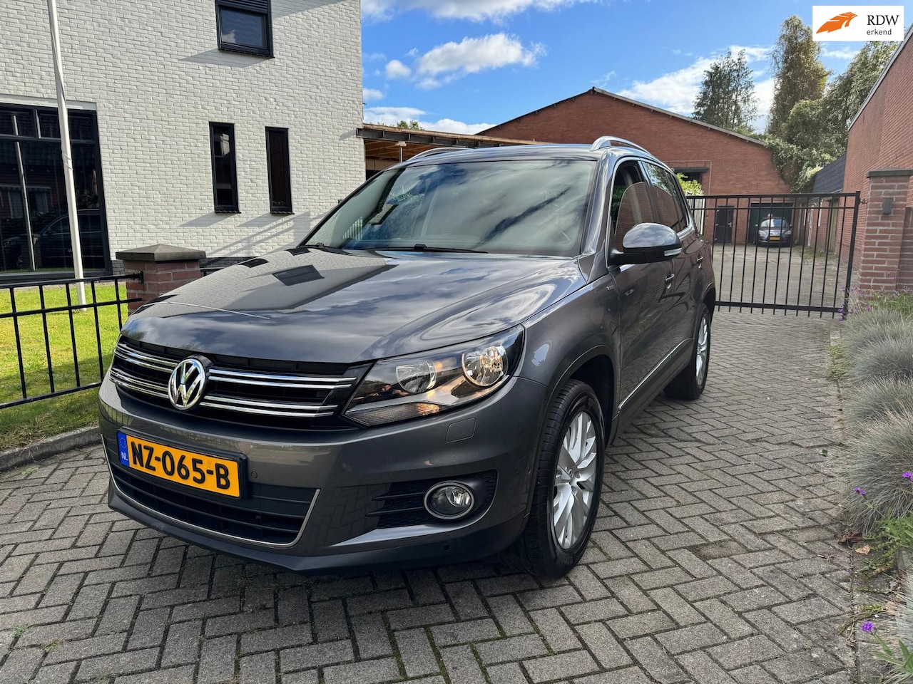 Volkswagen Tiguan - 1.4 TSI Sport&Style Live Edition Navi Clima Cruise - AutoWereld.nl