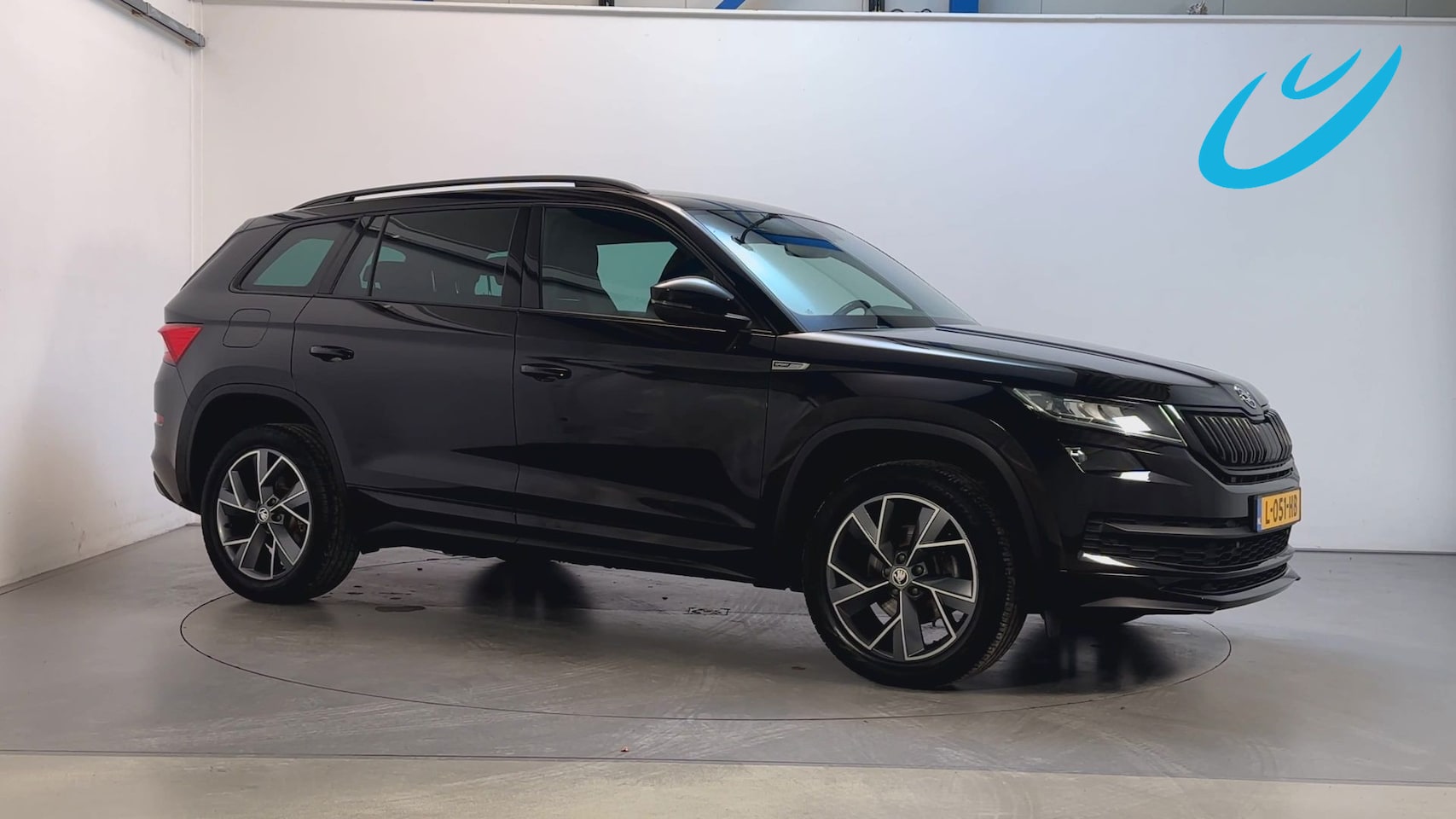 Skoda Kodiaq - 1.5 TSI 150pk Sportline Business Trekhaak Camera Stoelverwarming Sfeerverlichting - AutoWereld.nl