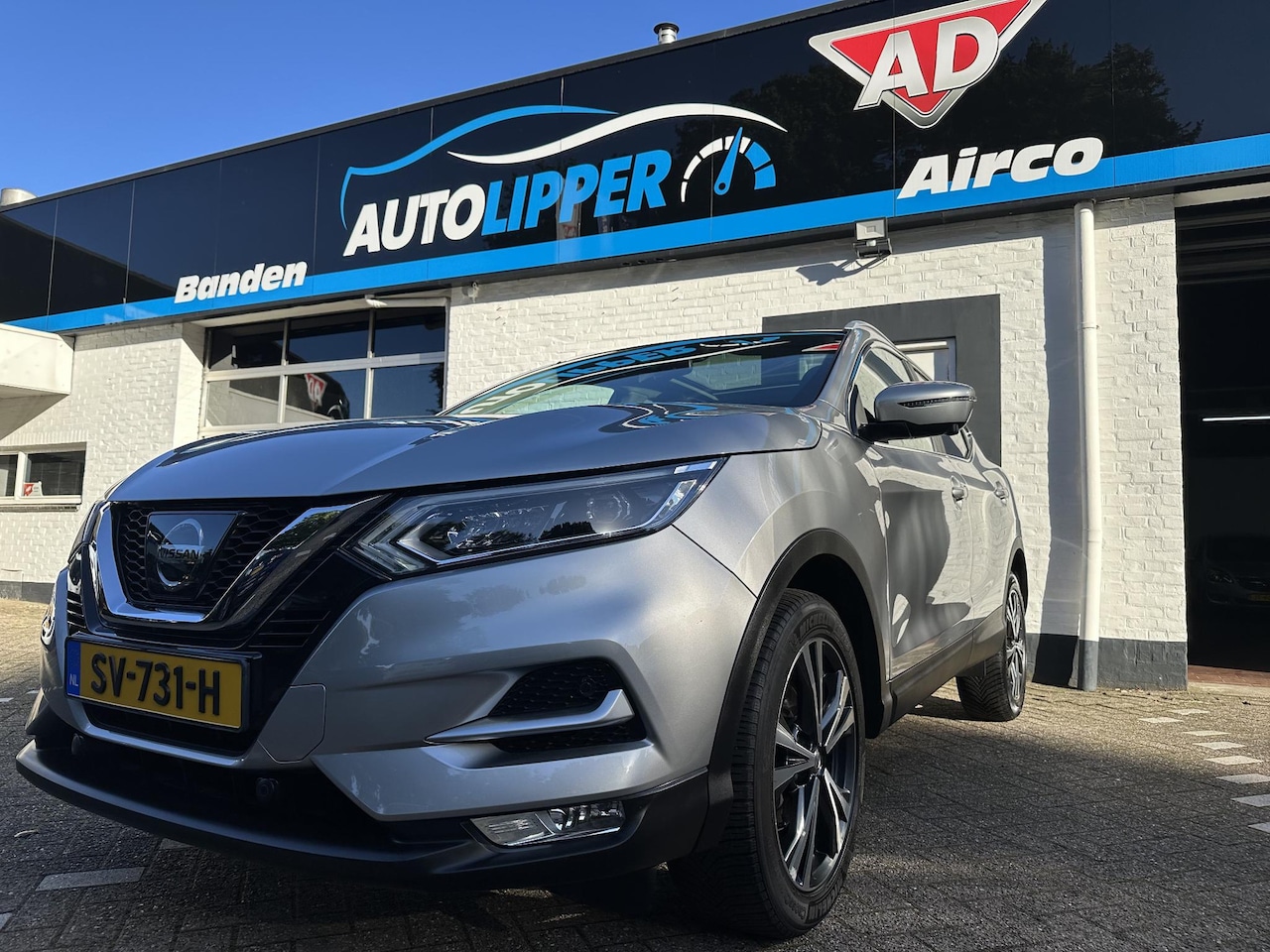 Nissan Qashqai - 1.2 Tekna /nieuwe apk/CC/ camera/Lm velgen/All season banden/panoramaraam - AutoWereld.nl
