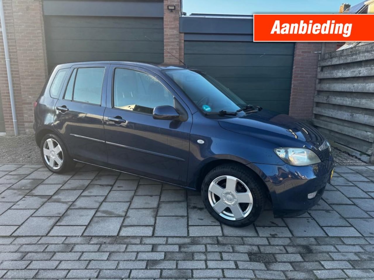 Mazda 2 - 1.4 EXCLUSIVE / AIRCO / ELEK.RAMEN / STUURBEKR. / APK 2027! - AutoWereld.nl