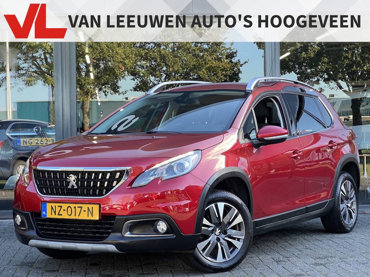 Peugeot 2008 - 1.2 PureTech Allure | Trekhaak | Navi | Climate | NAP - AutoWereld.nl