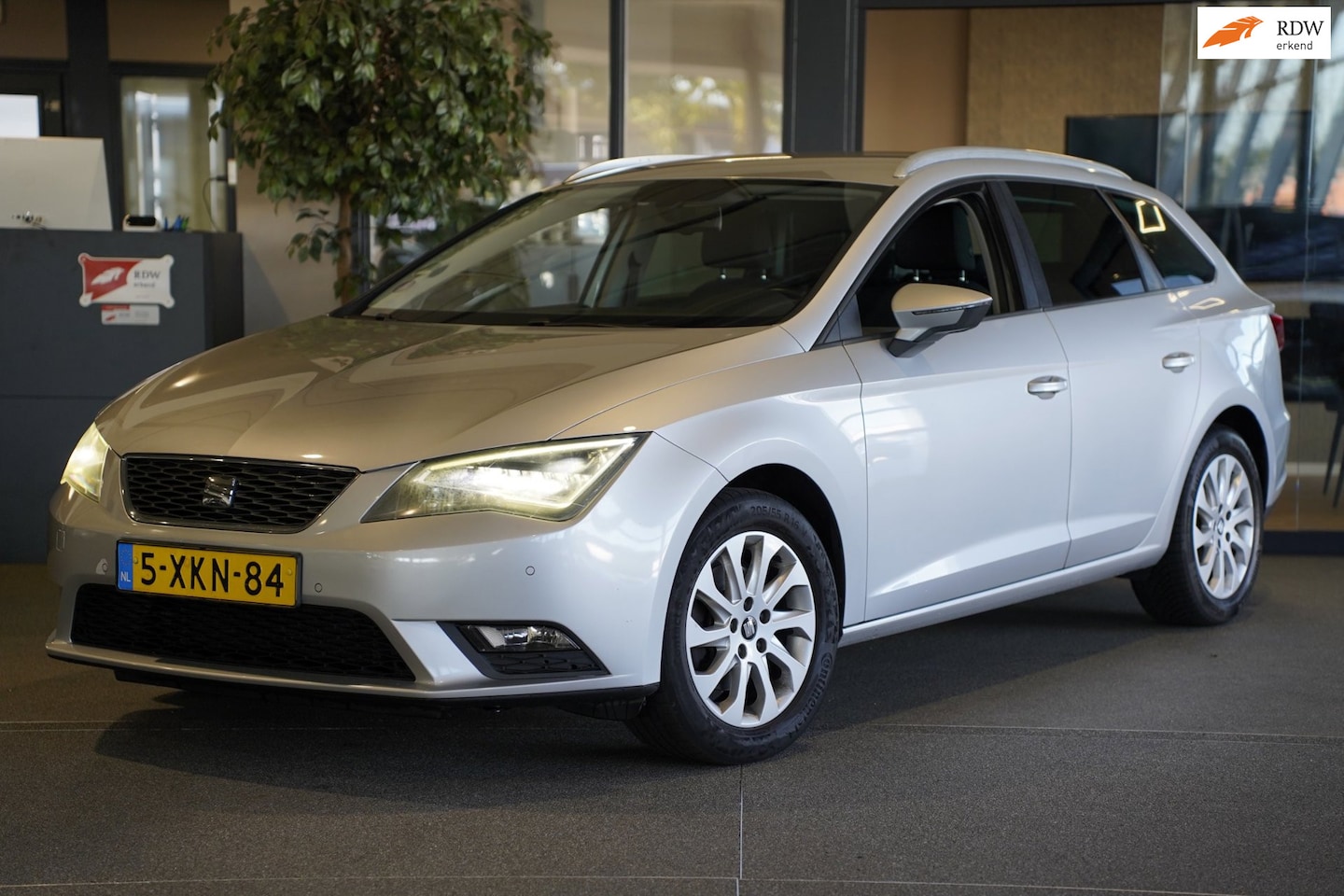 SEAT Leon ST - 1.2 TSI Style Business Navi Xenon Cruise Airco Pdc - AutoWereld.nl