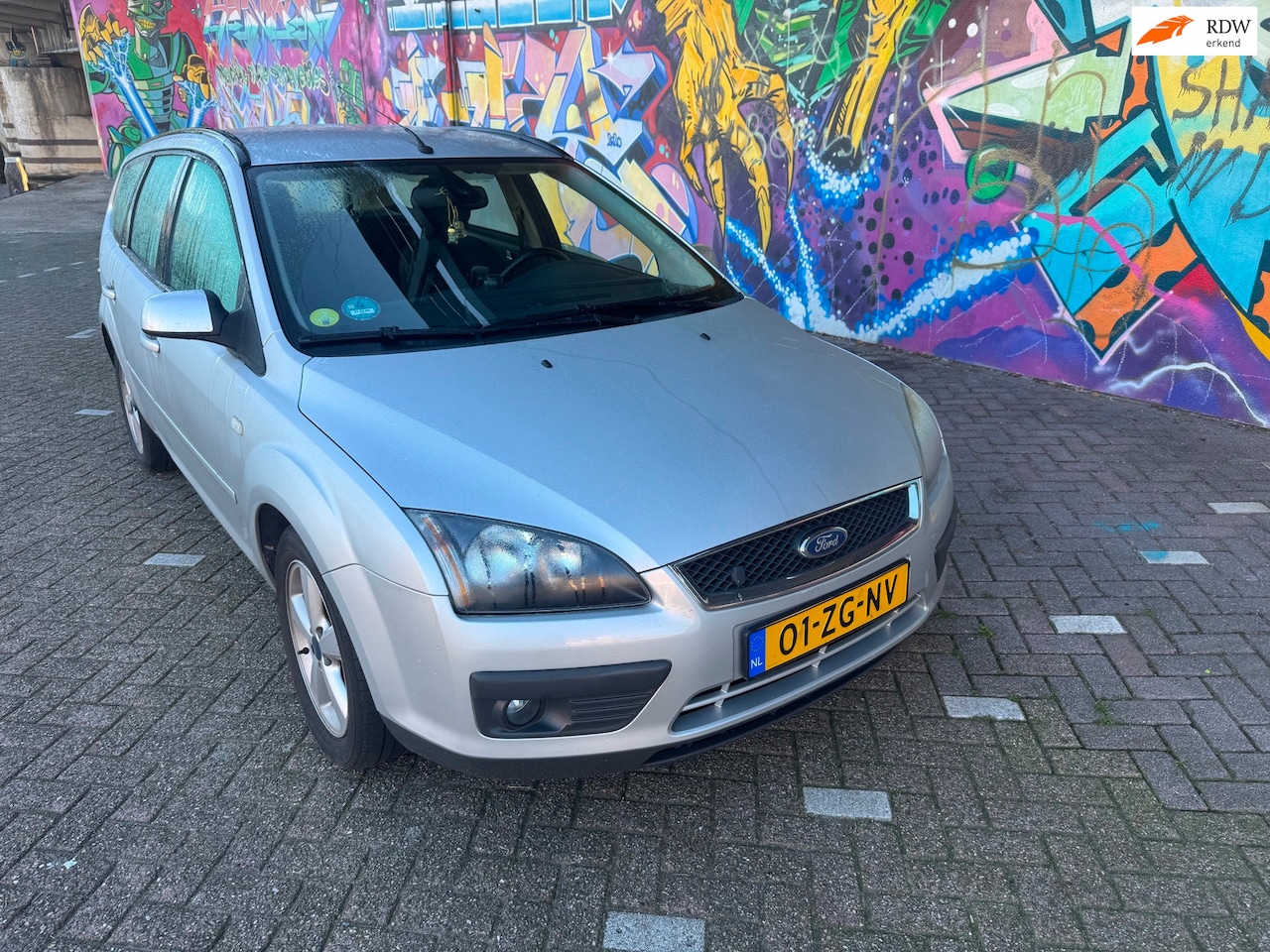 Ford Focus Wagon - 1.8-16V Ambiente Flexifuel navigatie airconditioning verwarmde stoelen boeken aanwezig rij - AutoWereld.nl