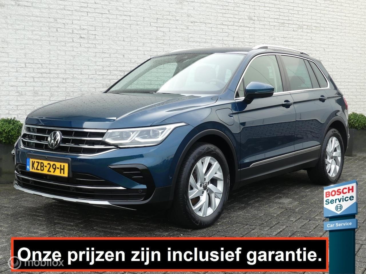 Volkswagen Tiguan - 1.4 eHYBRID ELEGANCE 245PK SOH 91% CAMERA/TREKHAAK/HUD/EL.A-KLEP/STOEL+STUURVERW - AutoWereld.nl