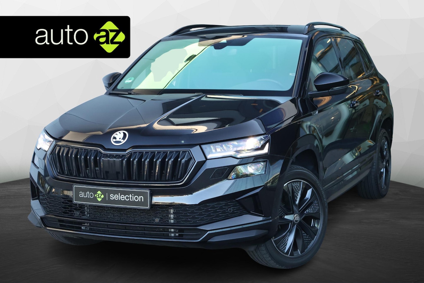 Skoda Karoq - 1.5 TSI ACT Sportline Business / Adaptive cruise / Carplay / Winter pack - AutoWereld.nl