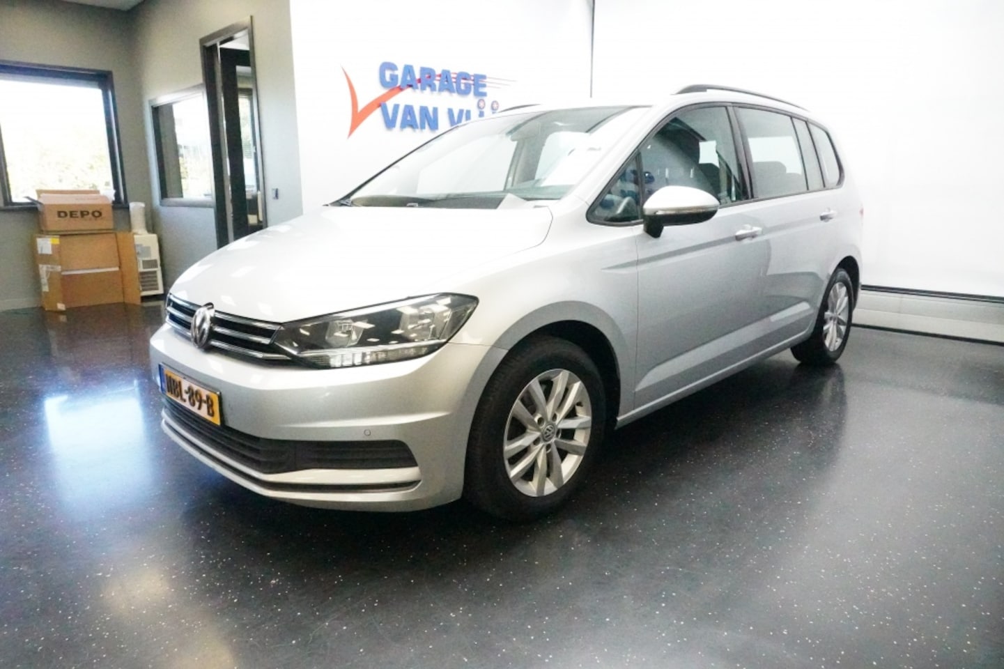 Volkswagen Touran - 1.4TSI 150PK Comfortline Automaat 7-persoons Navi/PDC - AutoWereld.nl