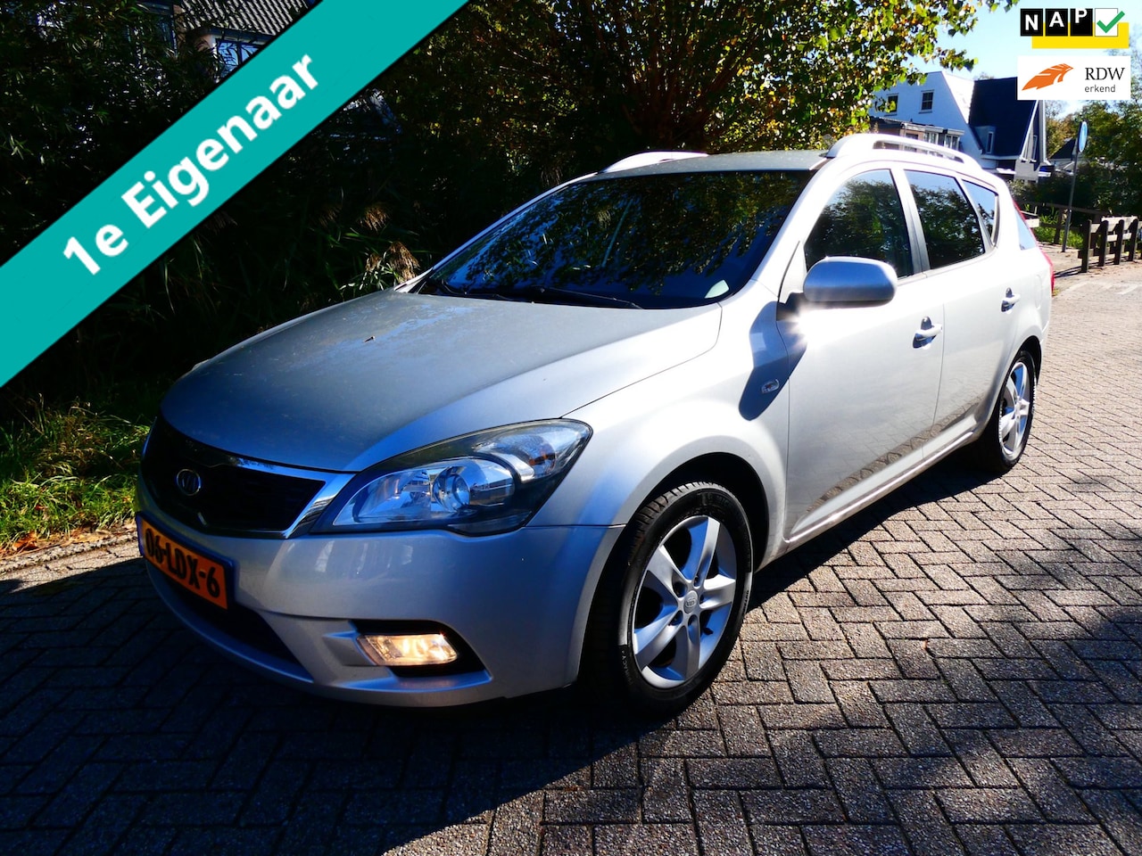 Kia Cee'd - 1.4 CVVT 90pk 1e eigenaar Clima Cruise Navi Trekhaak Historie - AutoWereld.nl