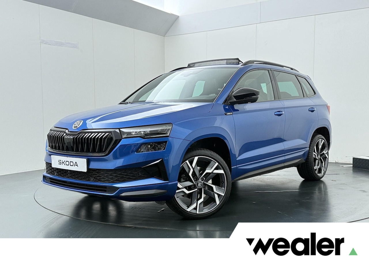 Skoda Karoq - 1.5 TSI 150 PK Sportline Business DSG | Automaat | Navigatie | Panoramadak | Skoda Sound | - AutoWereld.nl