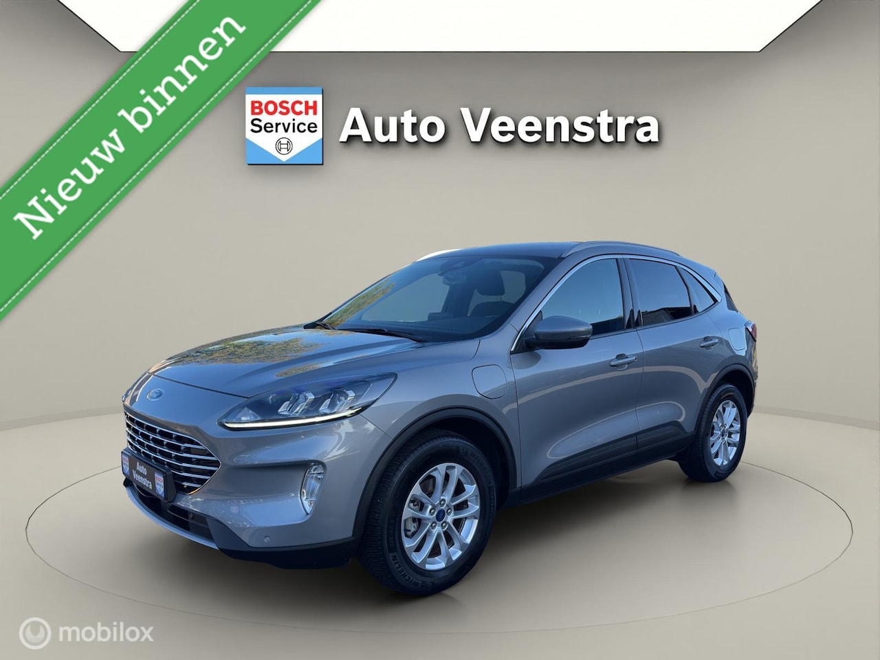 Ford Kuga - 2.5 PHEV Titanium|STOEL/STUUR.VERW|CARPLAY|PDC - AutoWereld.nl