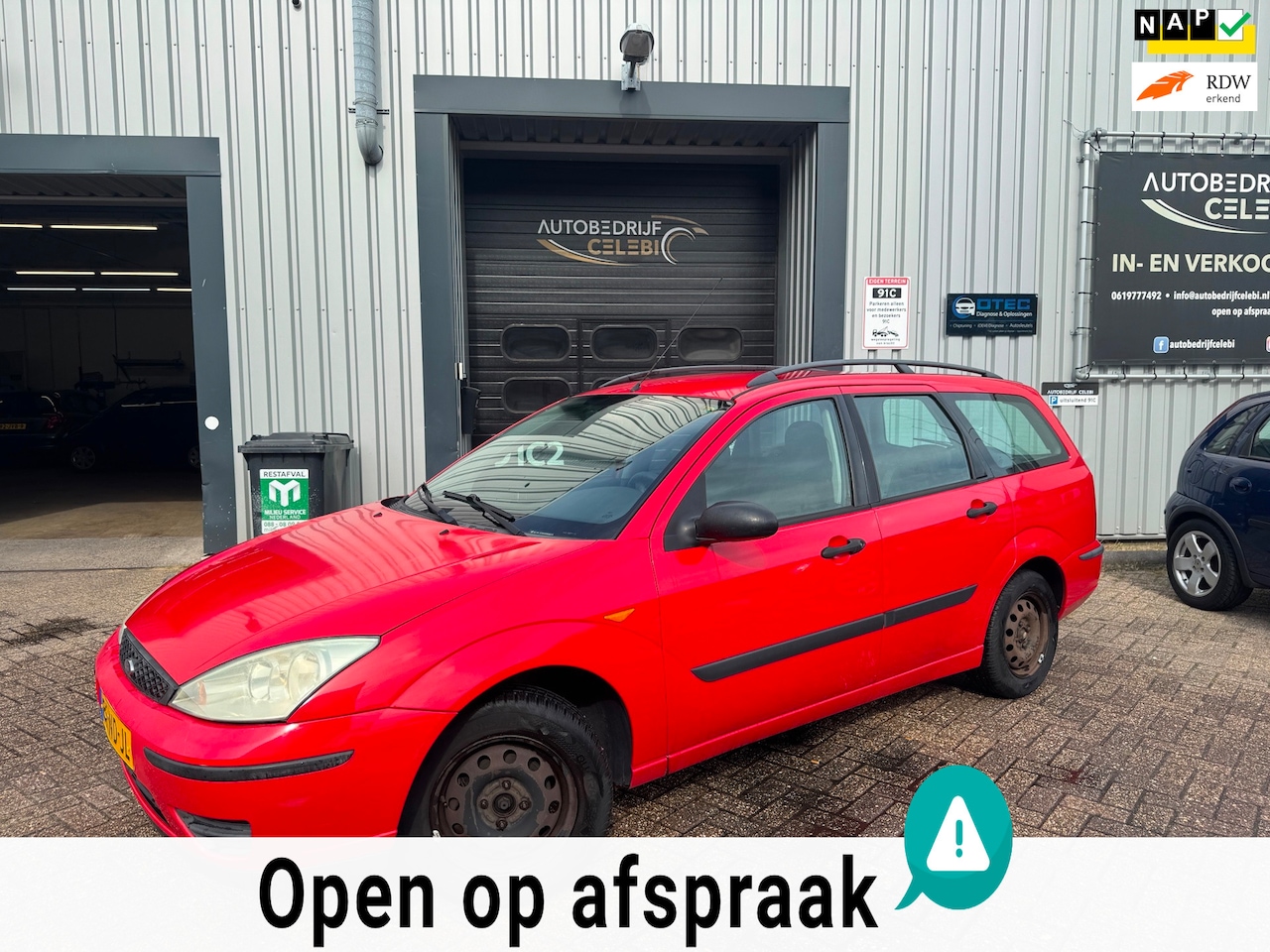 Ford Focus Wagon - 1.6-16V Centennial 2003 ROOD - AutoWereld.nl