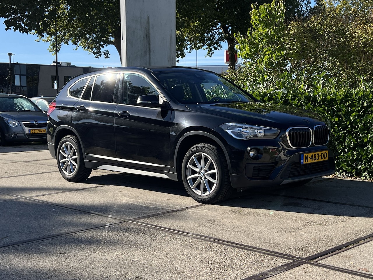 BMW X1 - sDrive20i High Executive | CRUISE | STOELVERW. | NAVI | 19526 - AutoWereld.nl
