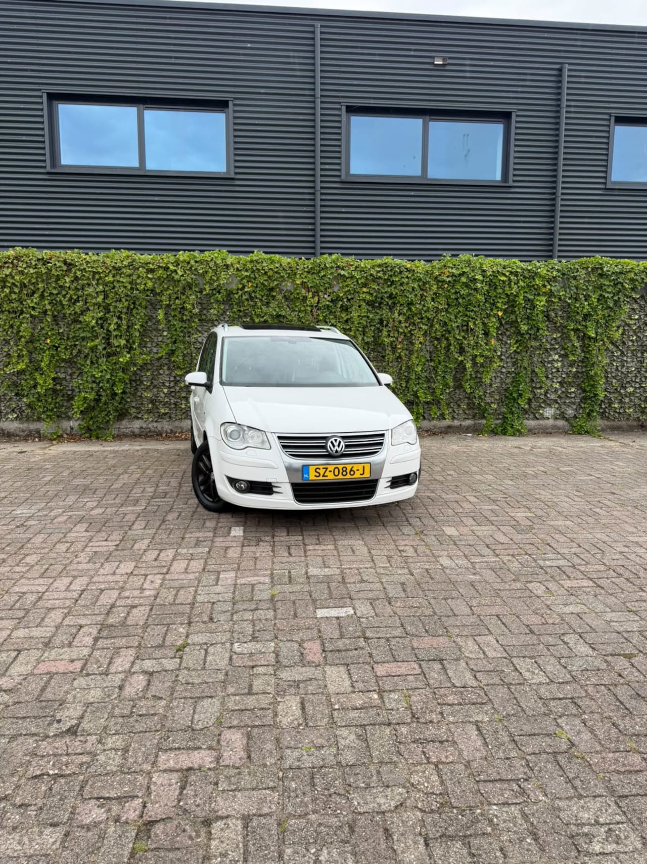 Volkswagen Touran - 1.4 TSI Highline 1.4 TSI Highline - AutoWereld.nl
