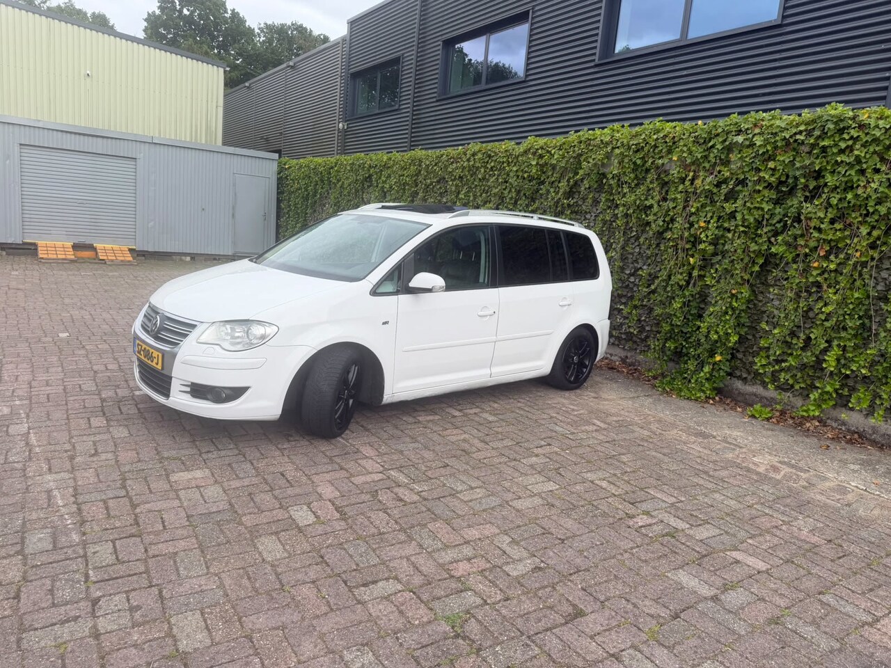 Volkswagen Touran - 1.4 TSI Highline 1.4 TSI Highline - AutoWereld.nl