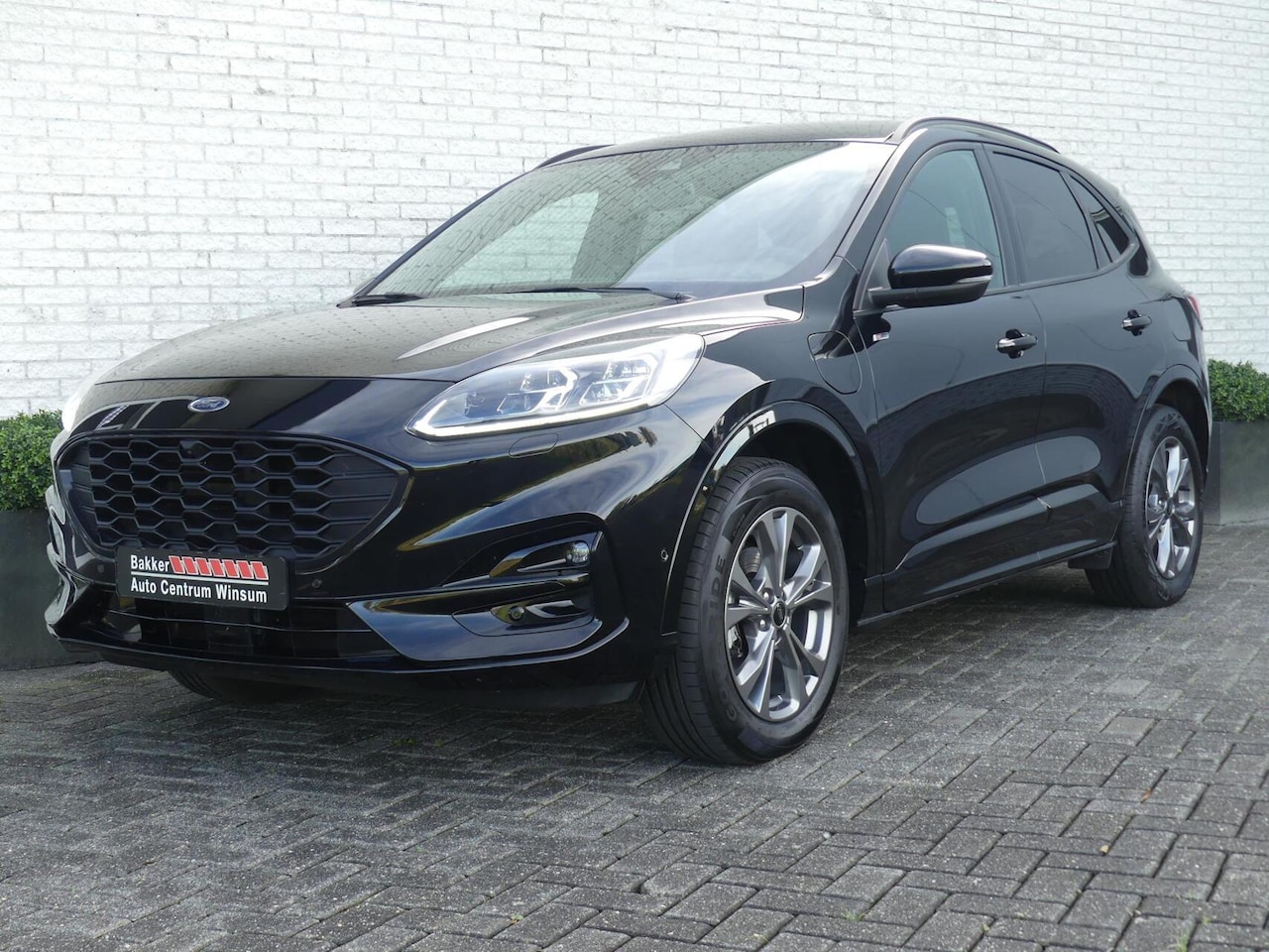 Ford Kuga - 2.5 PHEV ST-LINE X 225PK CAMERA/ADAP.CRUISE/ELEK.A-KLEP/STOELVERW - AutoWereld.nl
