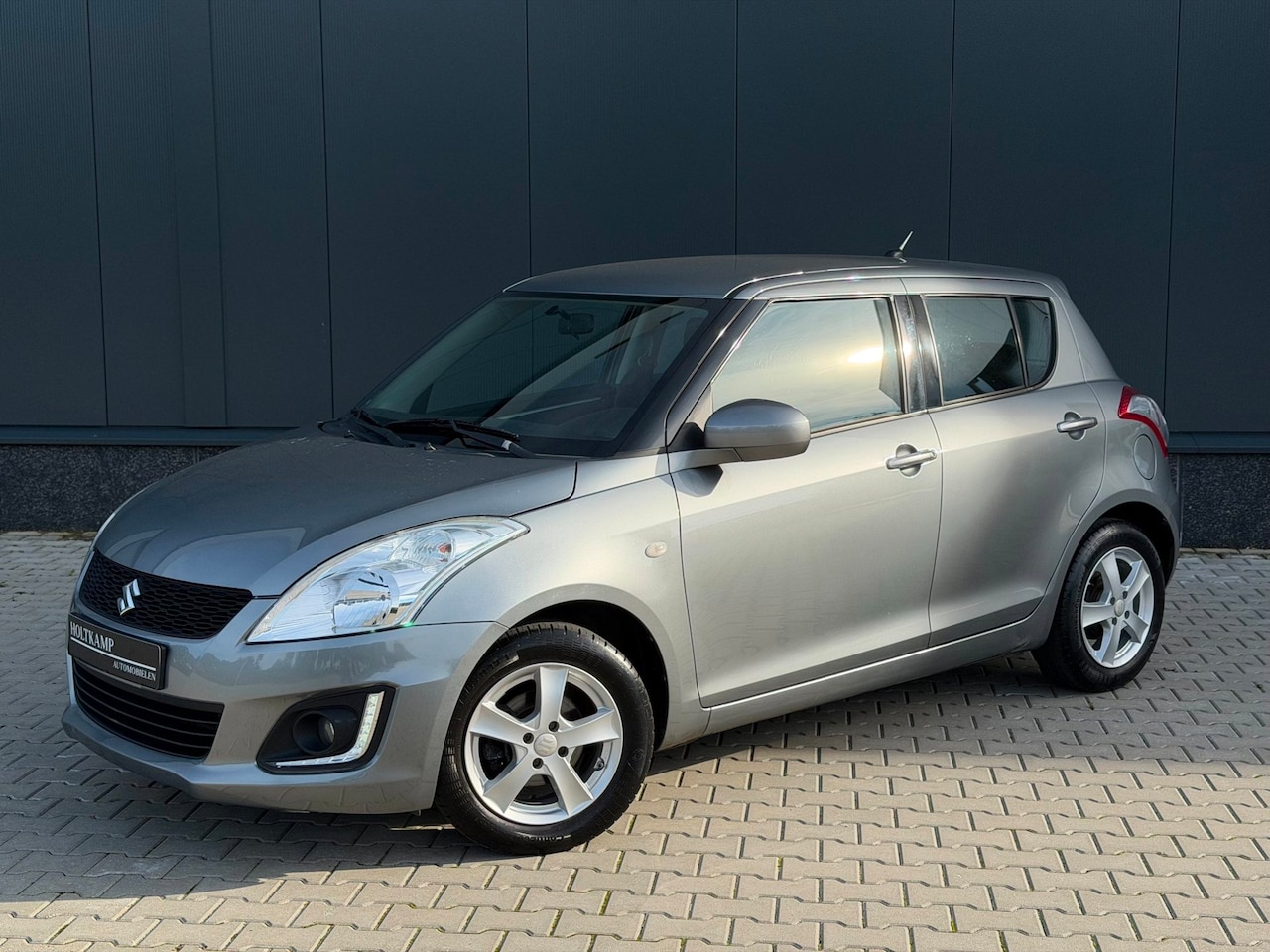 Suzuki Swift - 1.2 Exclusive EASSS | CRUISE | AIRCO | STOELVERWARMING - AutoWereld.nl