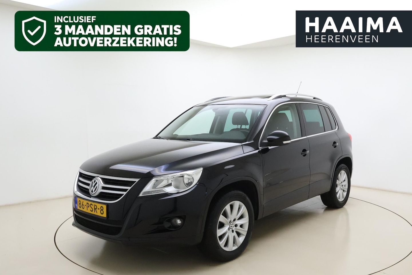 Volkswagen Tiguan - 1.4 TSI 150pk Sport&Style 4Motion | Navigatie | Panoramadak | Trekhaak wegklapbaar (2000 k - AutoWereld.nl