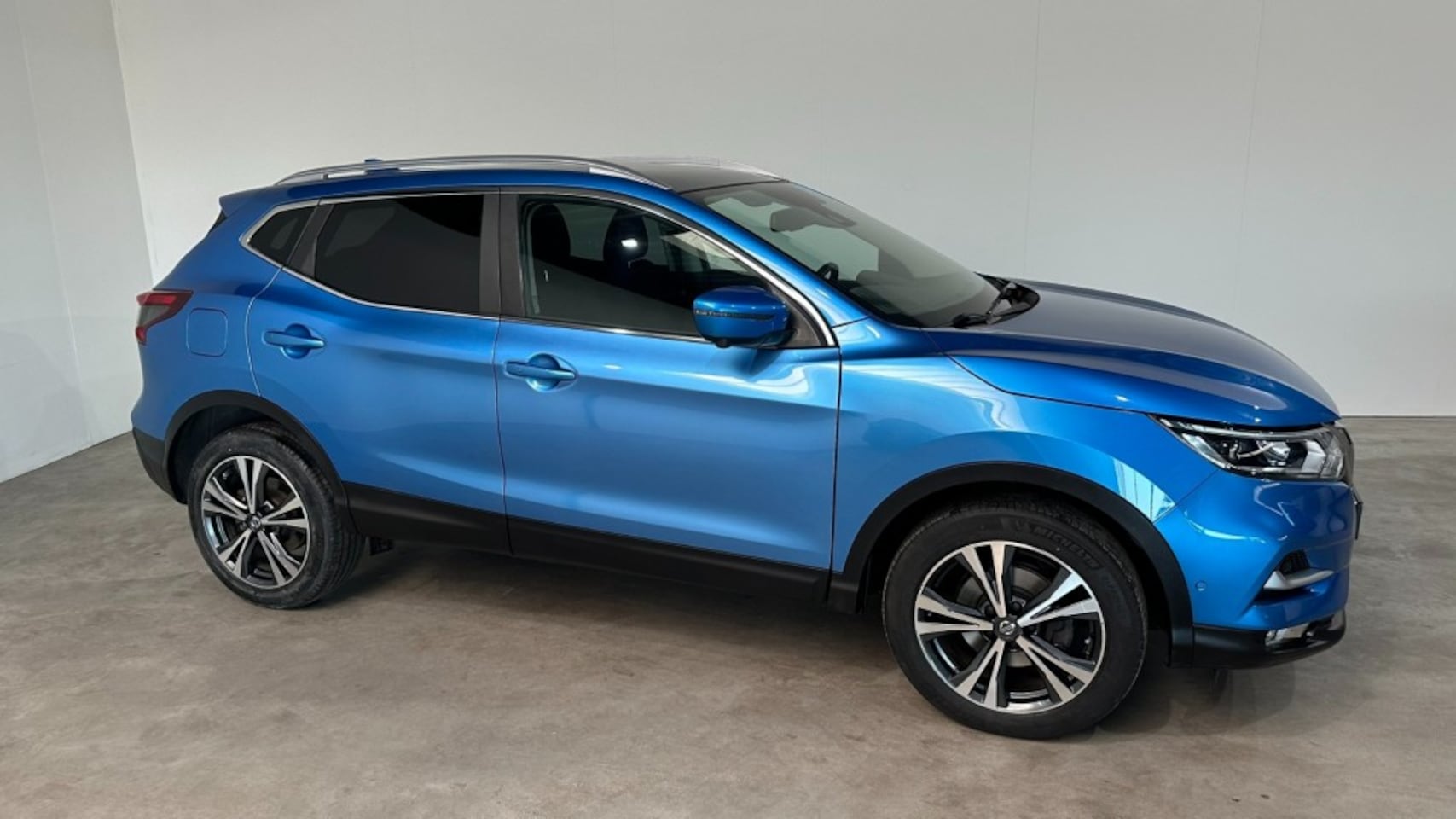Nissan Qashqai - 1.2, Connecta, stoel en voorruitverwarming, keyles,navigatie,pdc,camera - AutoWereld.nl