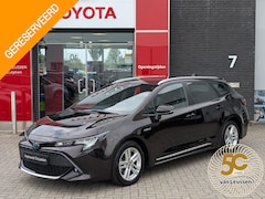Toyota Corolla Touring Sports - 1.8 Hybrid Active BRUIN MET. TREKHAAK ELEK. ACHTERKLEP STUUR- & STOELVERWARMING