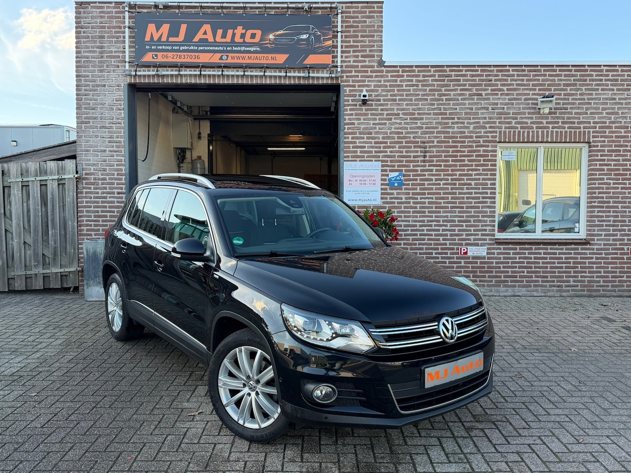 Volkswagen Tiguan - 1.4 TSI Sport&Style navi trekhaak key less - AutoWereld.nl