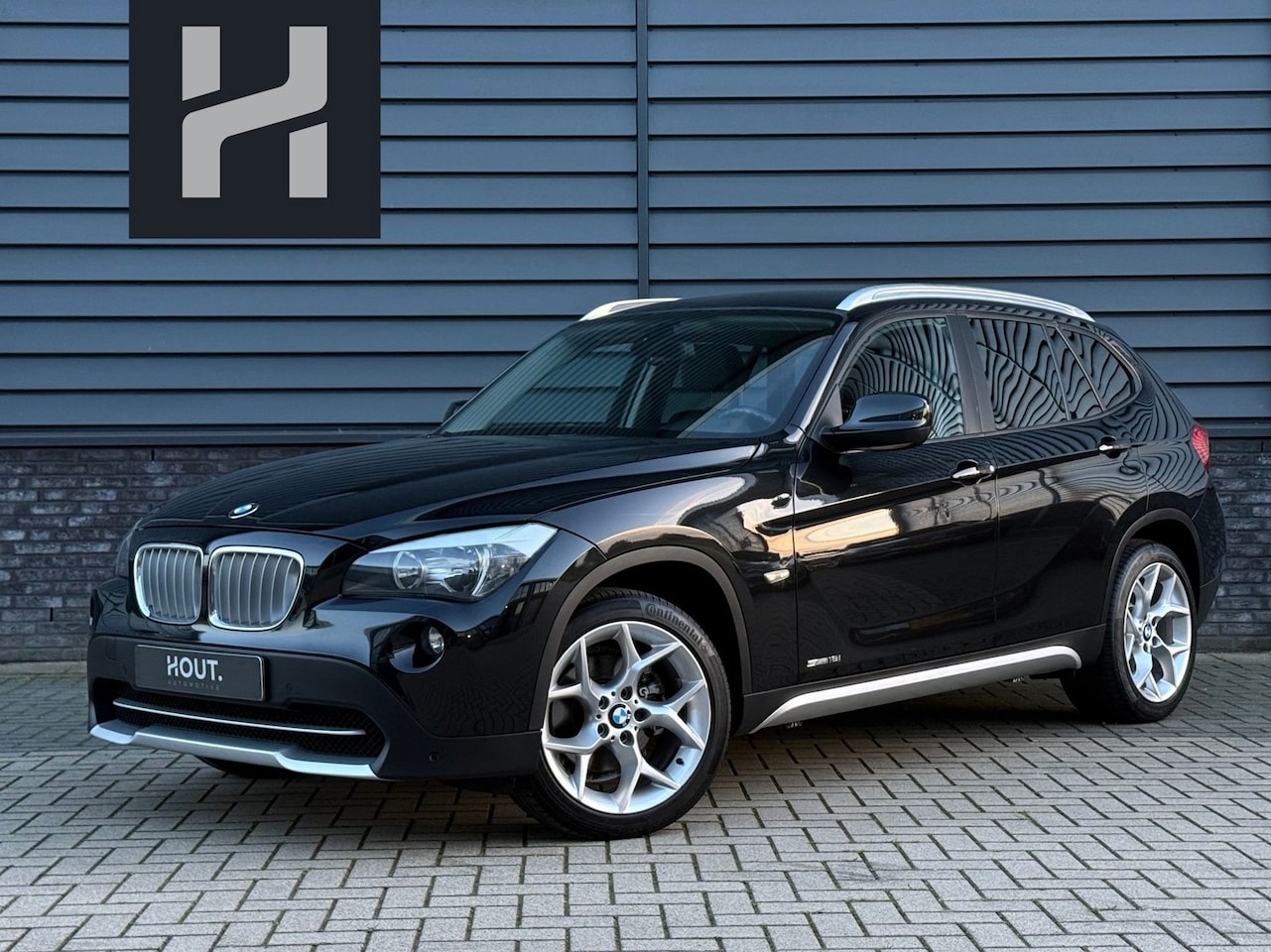 BMW X1 - SDrive18i Executive Trekhaak Airco Cruise PDC Navi - AutoWereld.nl