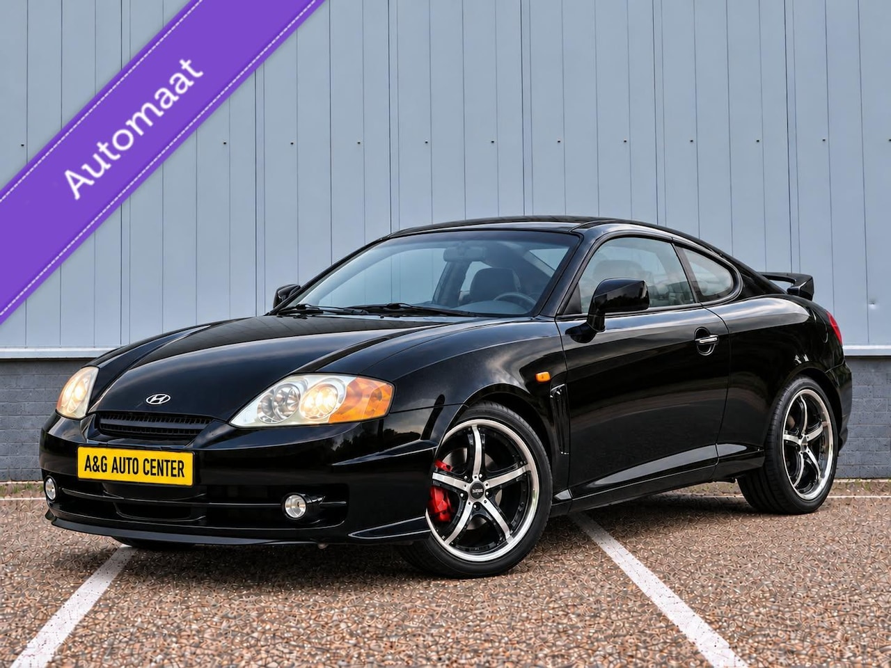 Hyundai Coupé - 2.7i Sport/1e Eig/Airco/Leer/18''/168 PK/Xenon - AutoWereld.nl
