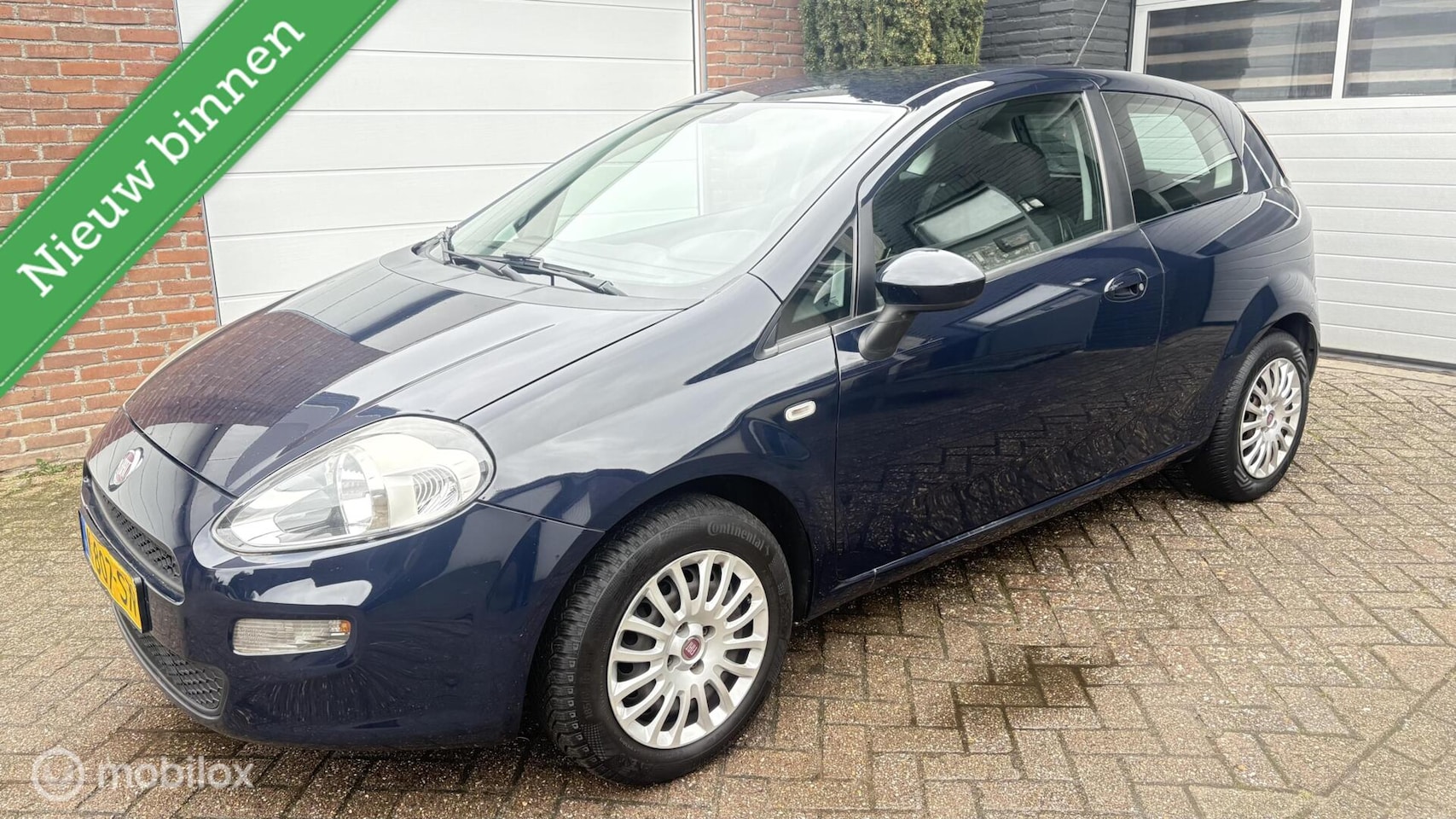 Fiat Punto Evo - 1.2 street * APK tot 10-2026 * - AutoWereld.nl