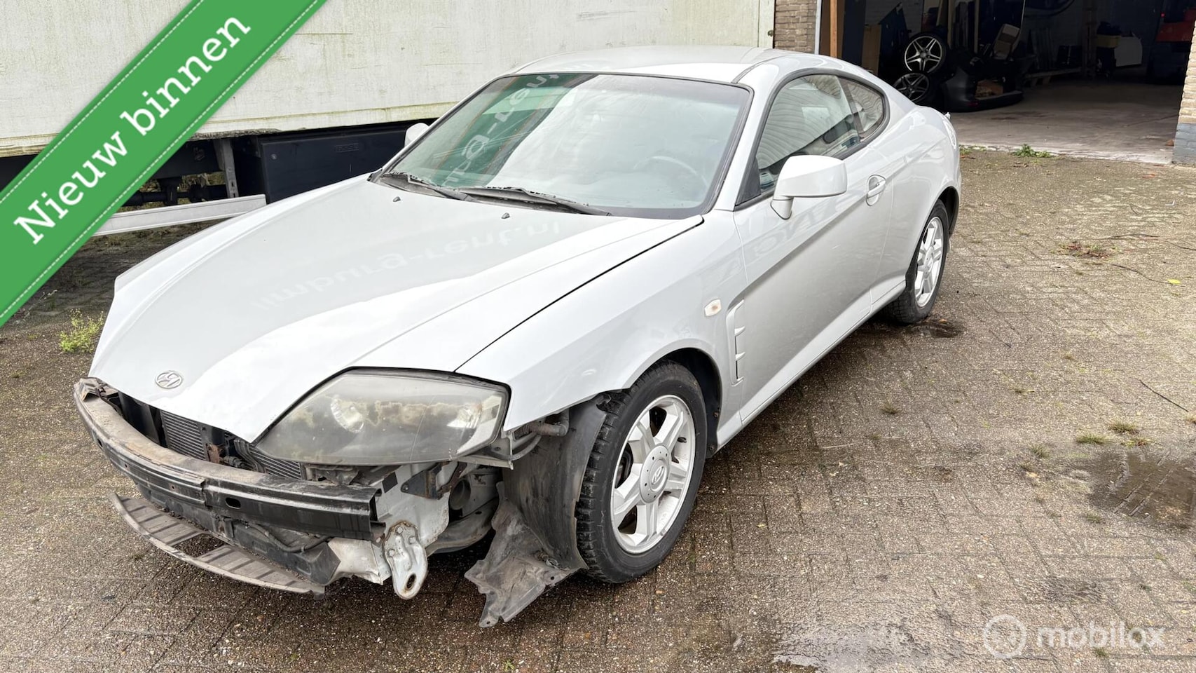 Hyundai Coupé - 2.0i CVVT Dynamic met werk - AutoWereld.nl