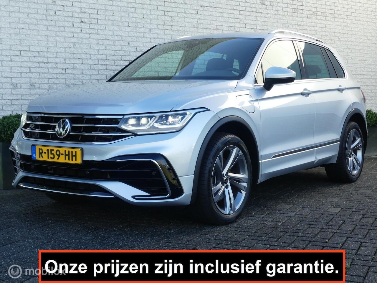 Volkswagen Tiguan - 1.4 eHybrid R-LINE + 245PK DSG NAVI/TREKHAAK/ELEK.A-KLEP/ADAP.CRUISE/IQ-LED - AutoWereld.nl