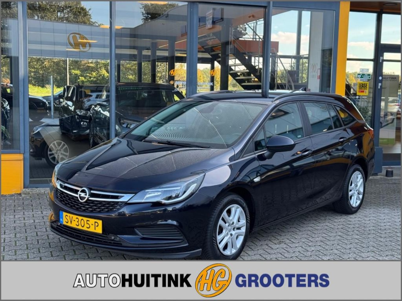 Opel Astra - 1.0 Online Edition - all season - sensoren - navi - AutoWereld.nl