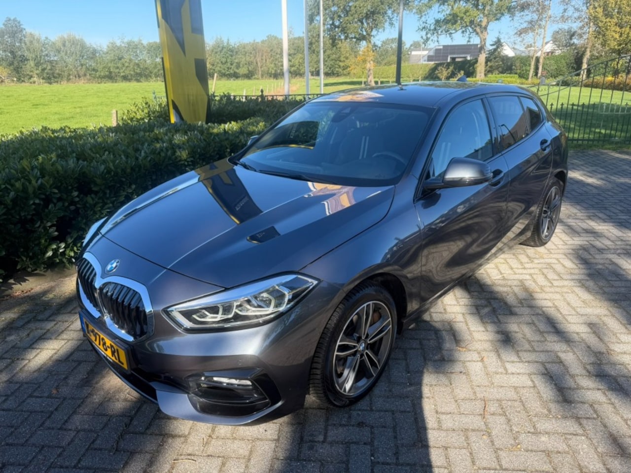 BMW 1-serie - 118i Executive Edition Aut7 Sport Line / Carplay - AutoWereld.nl