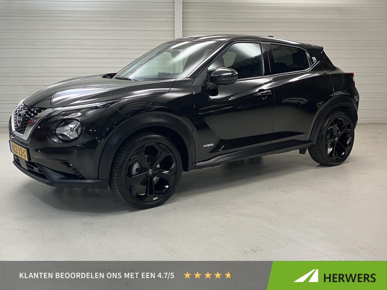 Nissan Juke - 1.6 Hybrid Tekna / Dealer Onderhouden / Apple CarPlay/Android Auto / Lederen bekleding / 1 - AutoWereld.nl