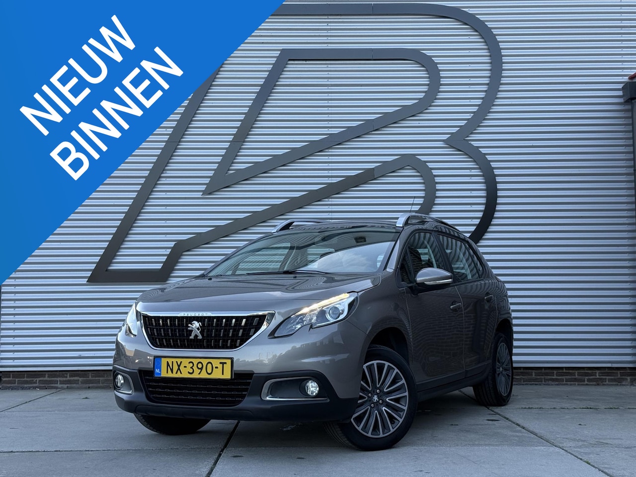 Peugeot 2008 - 1.2 PureTech Blue Lion 2e Eigenaar|Navi|Carplay|Airco|Cruise|PDC|N.A.P|APK tot 05-2027 - AutoWereld.nl