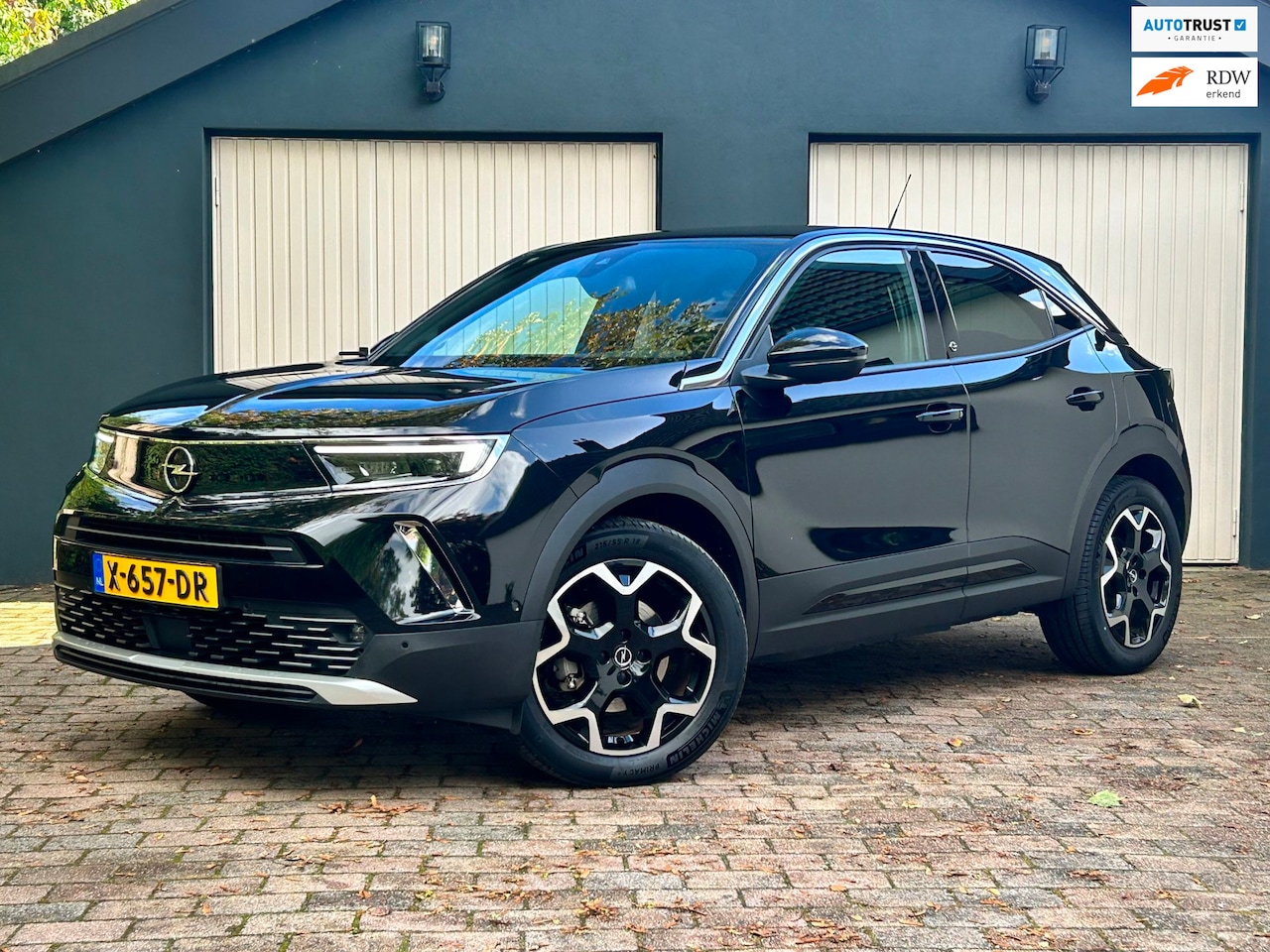Opel Mokka-e - Ultimate 50-kWh 11kw bl. | Stoel/stuurverwarming | 3-fase - AutoWereld.nl