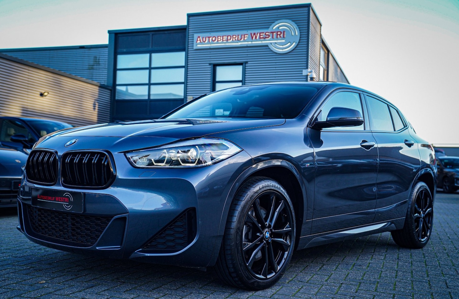 BMW X2 - XDrive20i High Executive | Stoelverwarming | Panorama | Head Up Display | M Sport onderste - AutoWereld.nl