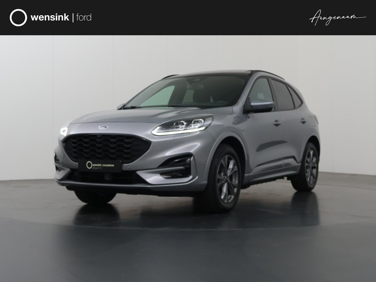 Ford Kuga - 2.5 PHEV ST-Line X | Panoramadak | Winterpakket | Adaptieve Cruise Control | B&O Audio | E - AutoWereld.nl