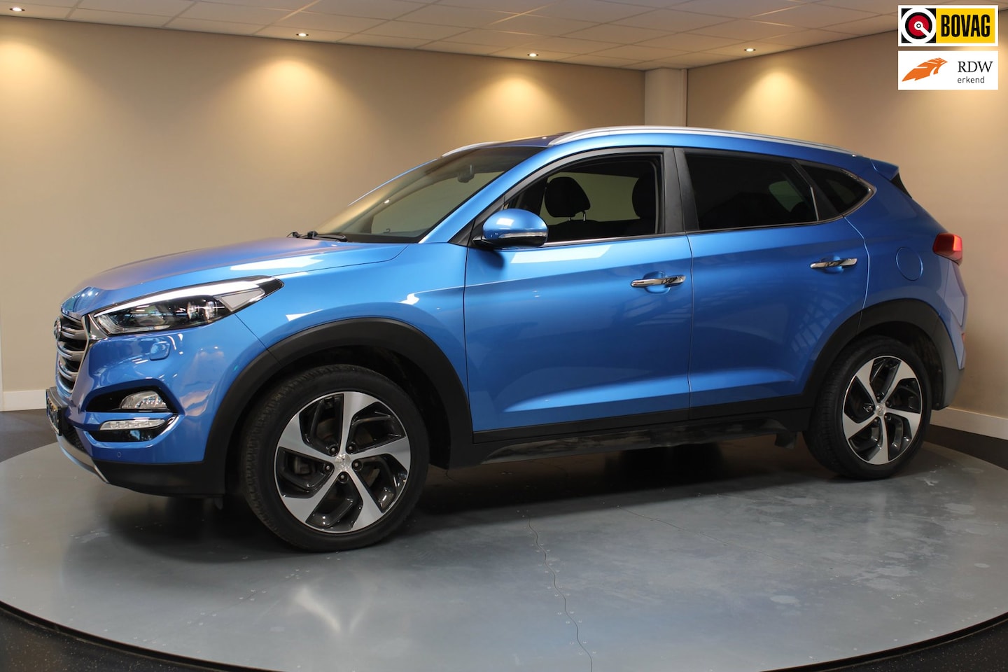 Hyundai Tucson - 1.6 T-GDi Comfort 4WD *Automaat* Dealer OH|Trekhaak|Stoel/Stuurverw.V+A|Cruise|Navi|Camera - AutoWereld.nl