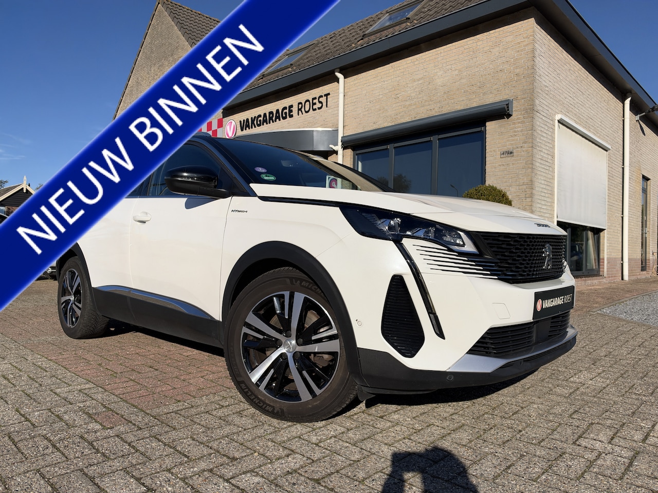 Peugeot 3008 - 1.6 HYbrid4 300 GT Automaat Trekhaak / All-Seasons / Plug-in - AutoWereld.nl