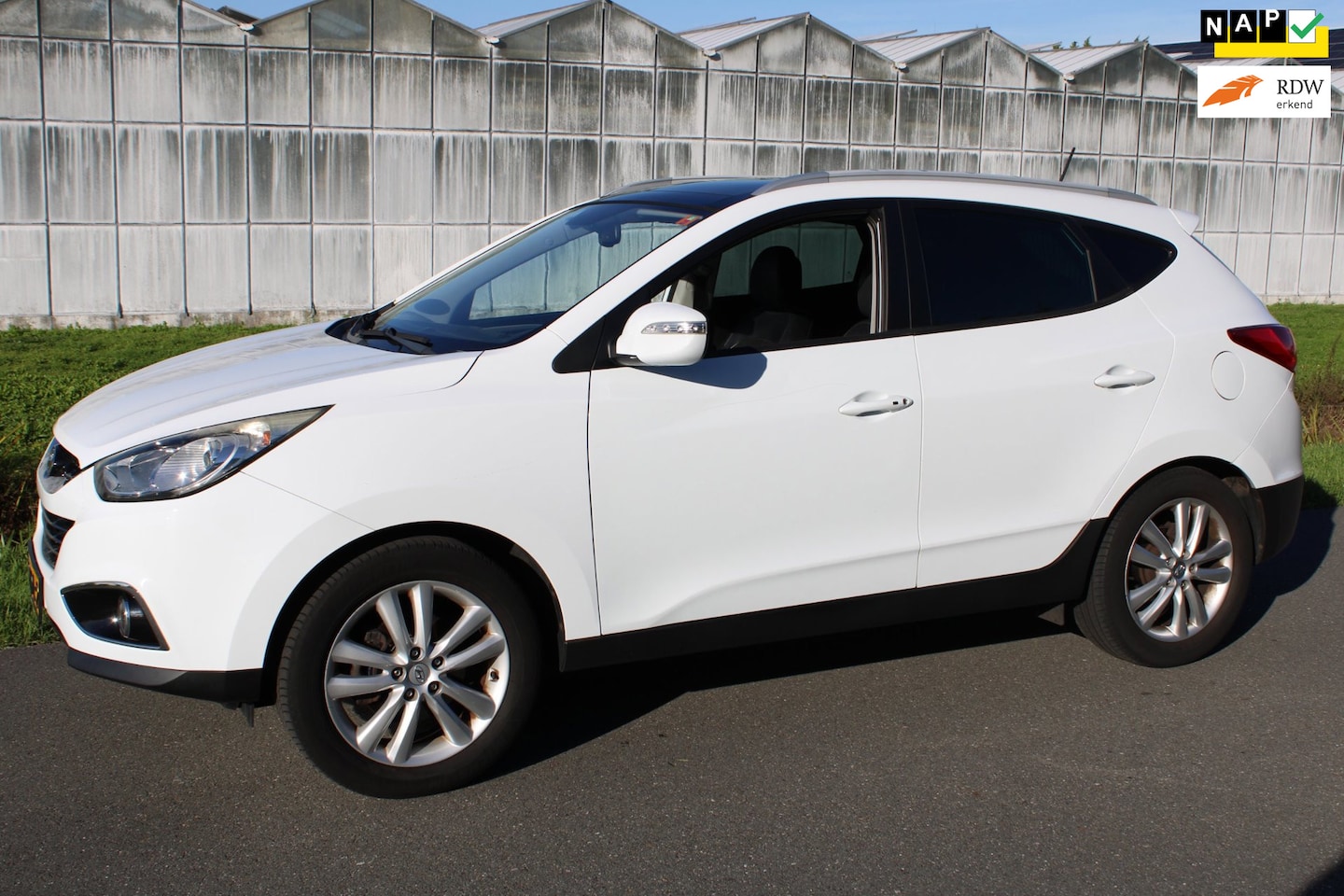 Hyundai ix35 - 2.0i i-Catcher Automaat met Leder en Navigatie - AutoWereld.nl