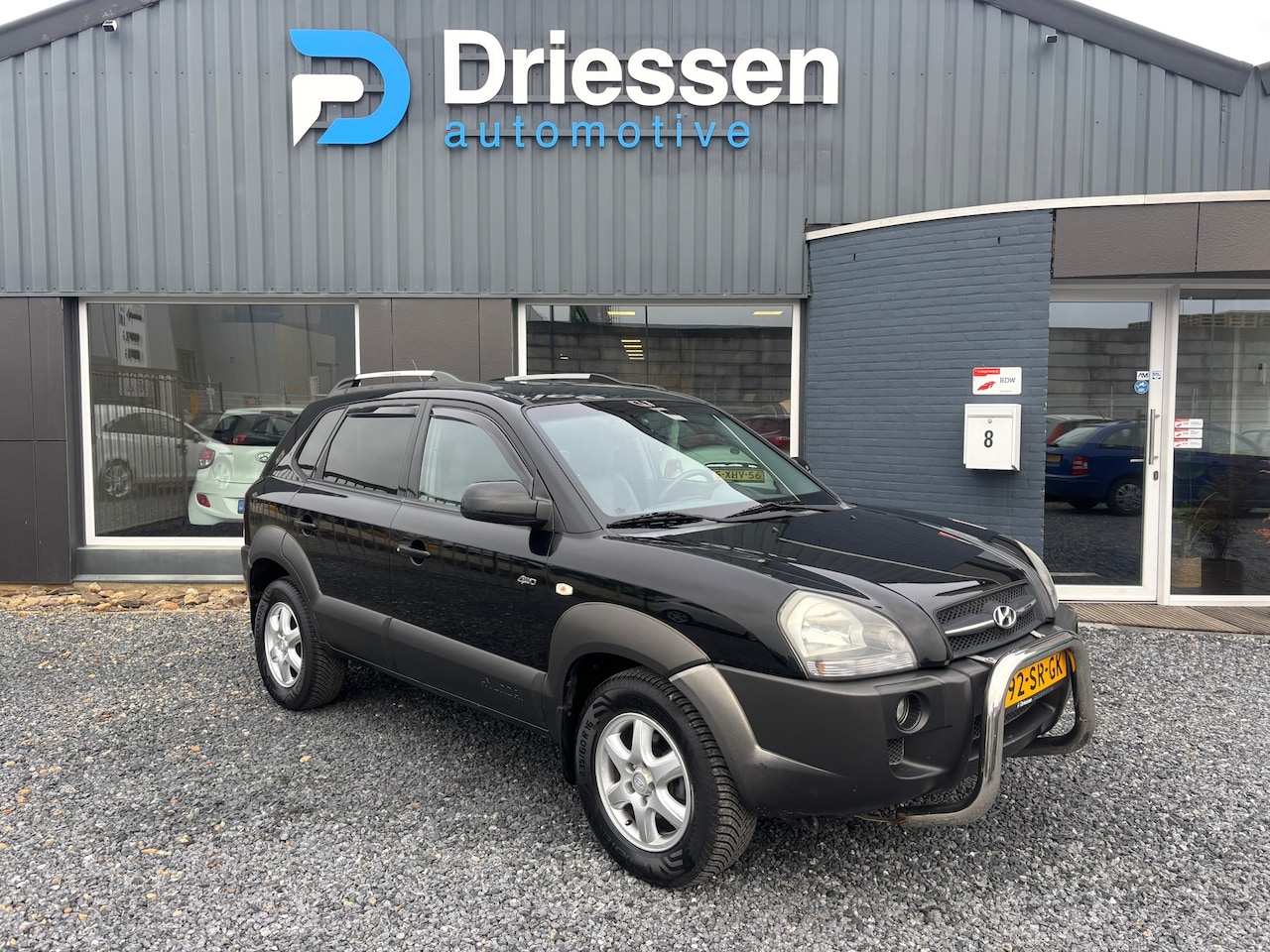 Hyundai Tucson - 2.7i V6 4WD Style | Aut. | Clima | Leder |APK 12-2027 - AutoWereld.nl