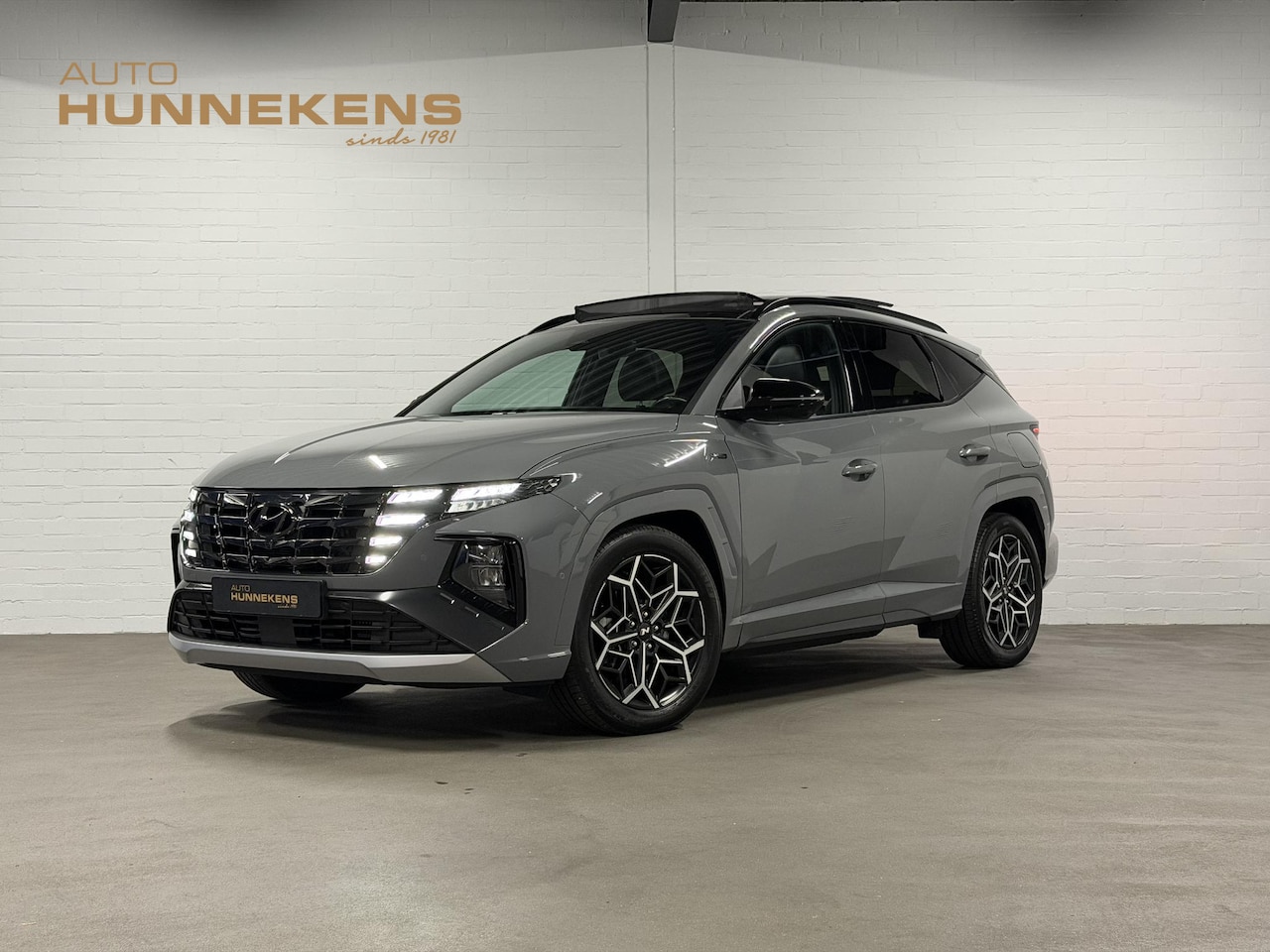 Hyundai Tucson - 1.6 T-GDI PHEV N Line Sky 4WD Open dak | Adapt. cruise | Self driving Park assist | Stoelv - AutoWereld.nl