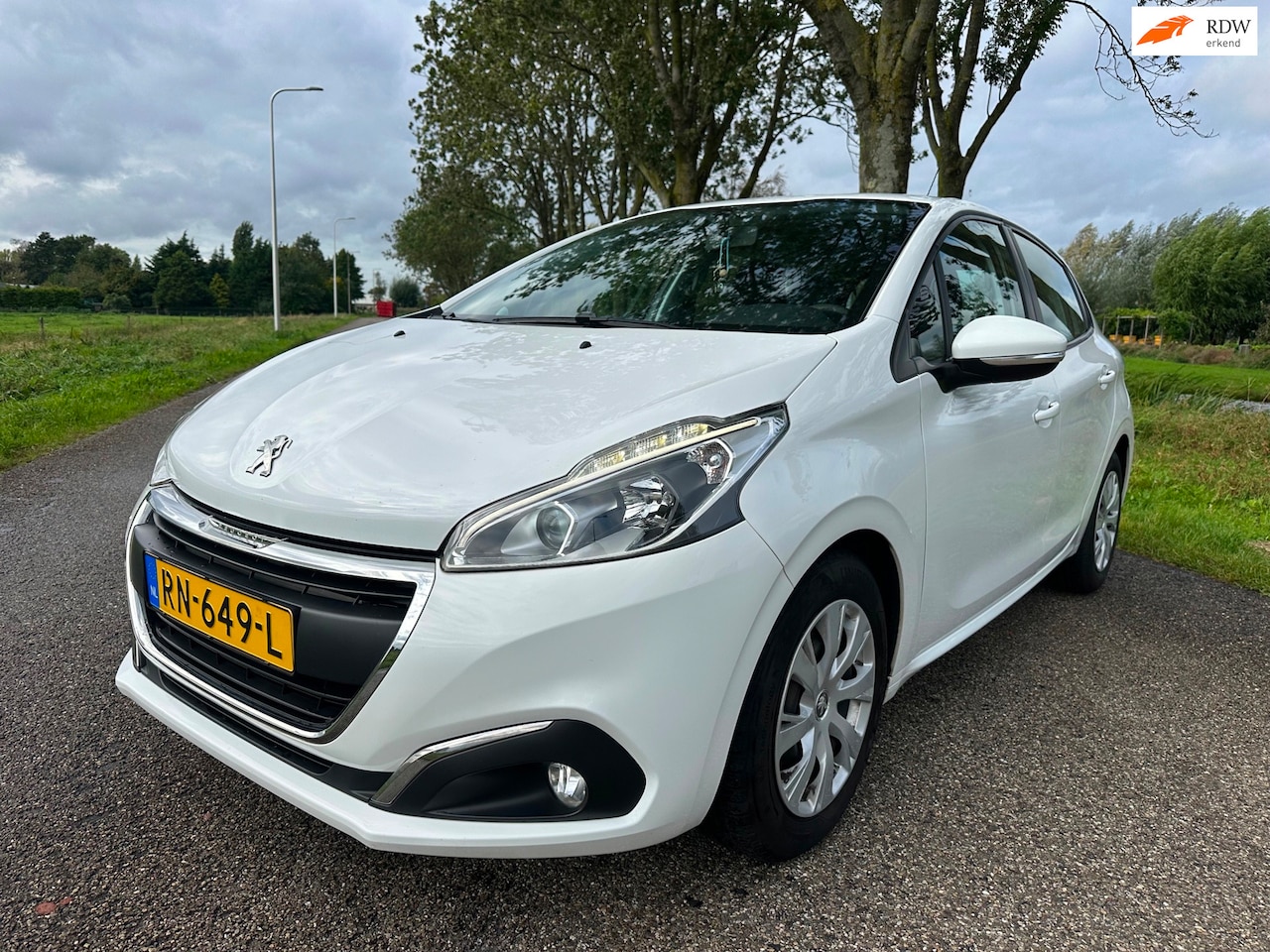Peugeot 208 - 1.2 Blue Lion|airco ijskoud|pdc|navi|cruise|nap - AutoWereld.nl