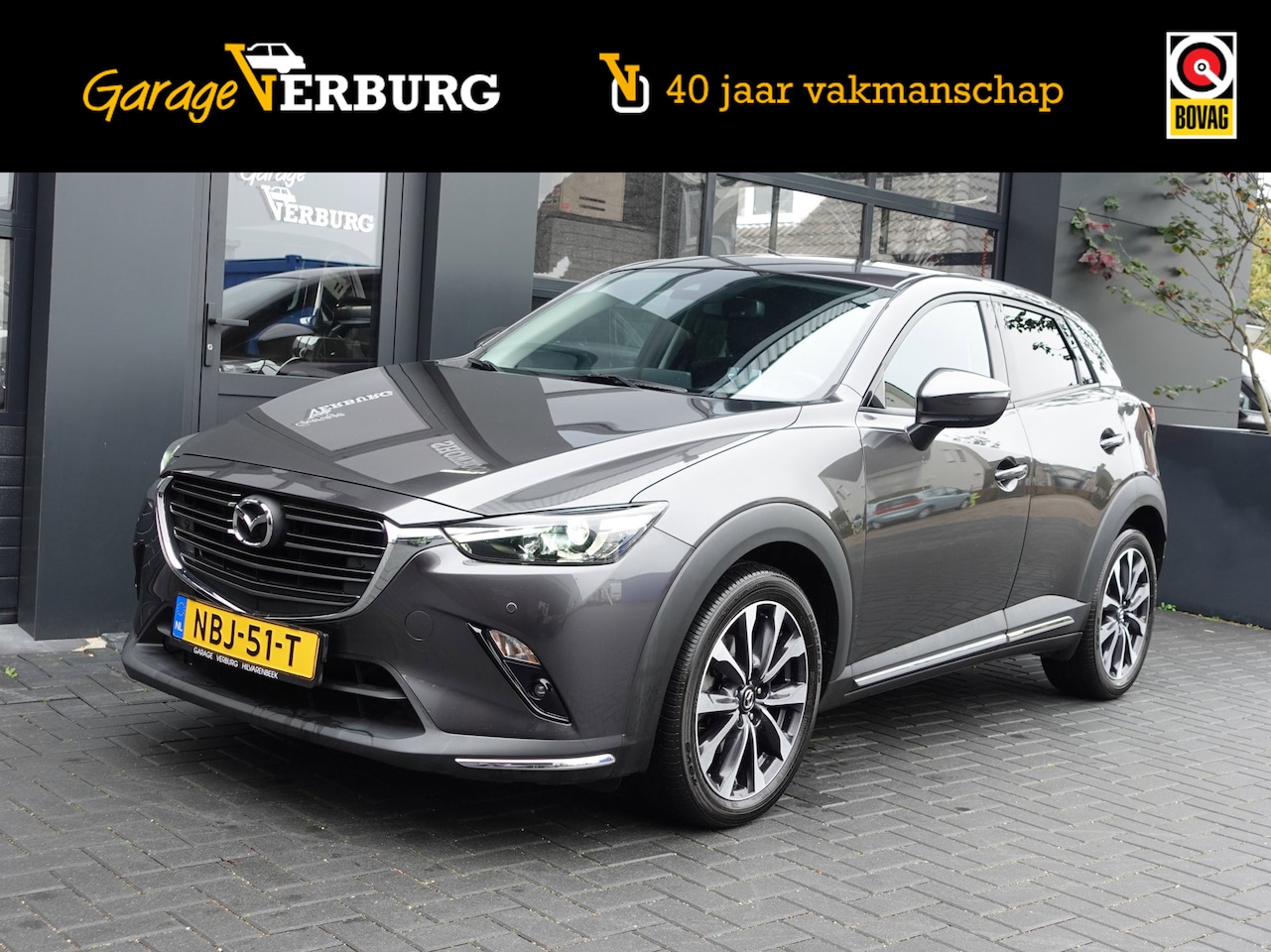 Mazda CX-3 - 2.0 SkyActiv-G 121 GT-M (Navigatie/Carplay,Camera,Cruise,PDC,Keyless,HUD,1/2 Leer) - AutoWereld.nl