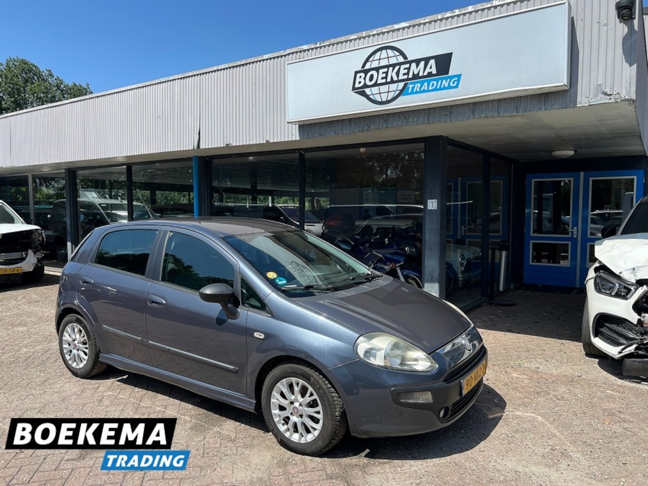 Fiat Punto Evo - 1.3 M-Jet Dynamic Navi Climate Cruise - AutoWereld.nl