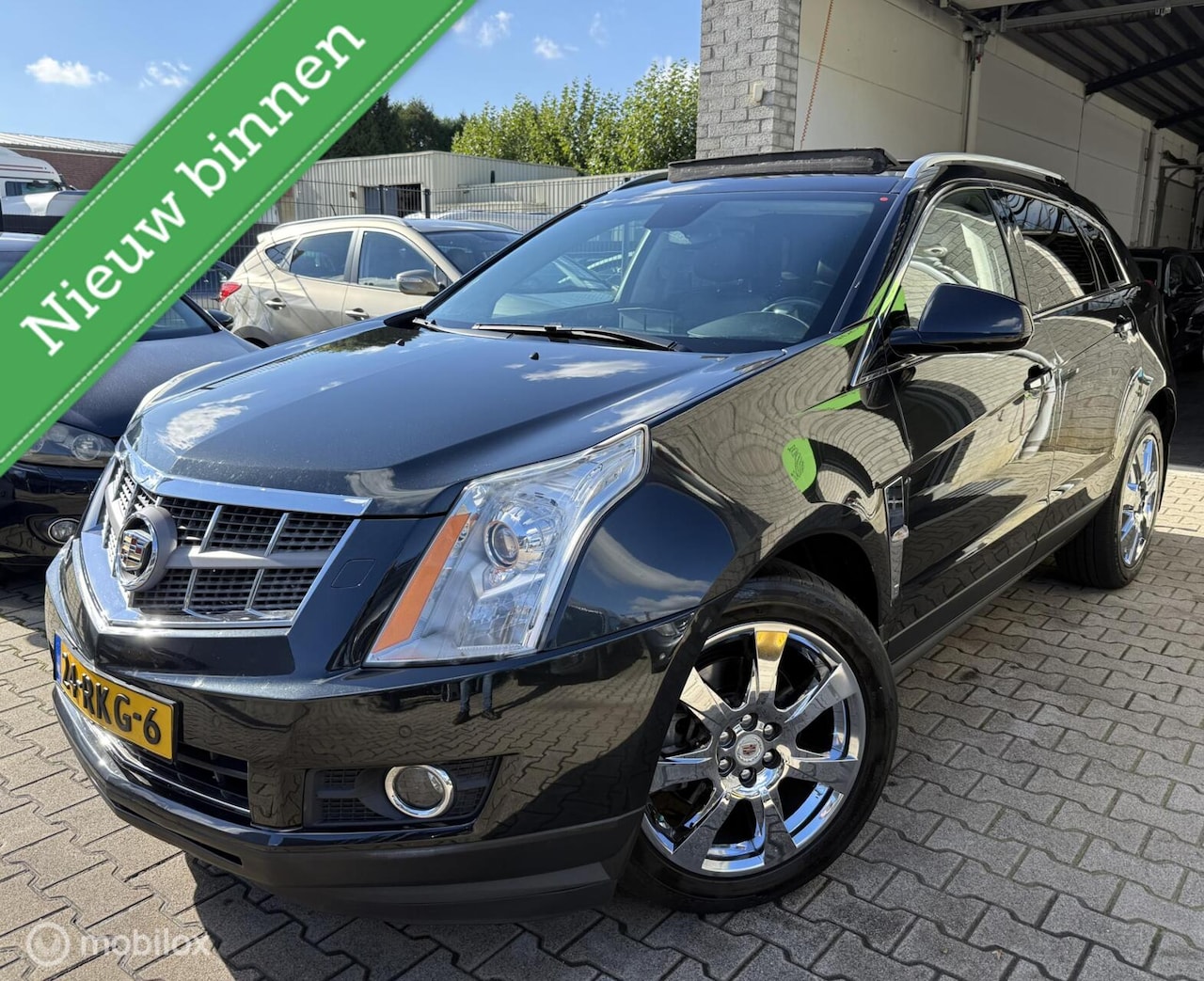 Cadillac SRX - 3.0 V6 AWD Elegance / Pano /Navi /Chrome /N.A.P - AutoWereld.nl