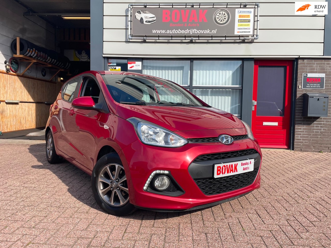 Hyundai i10 - 1.0i i-Drive Sound Red edition - AutoWereld.nl