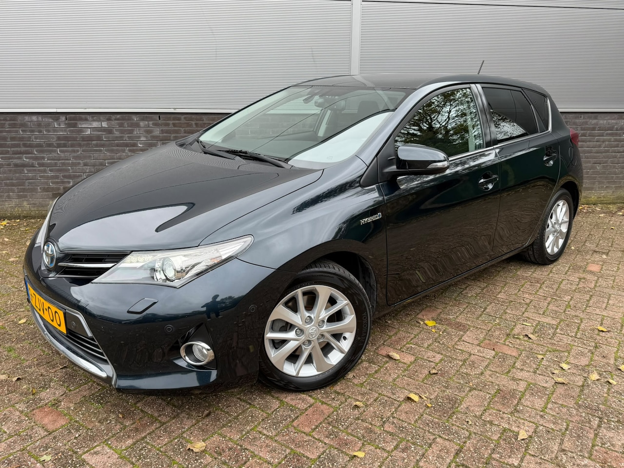 Toyota Auris - 1.8 Hybrid Lease+ met panaramadak - AutoWereld.nl