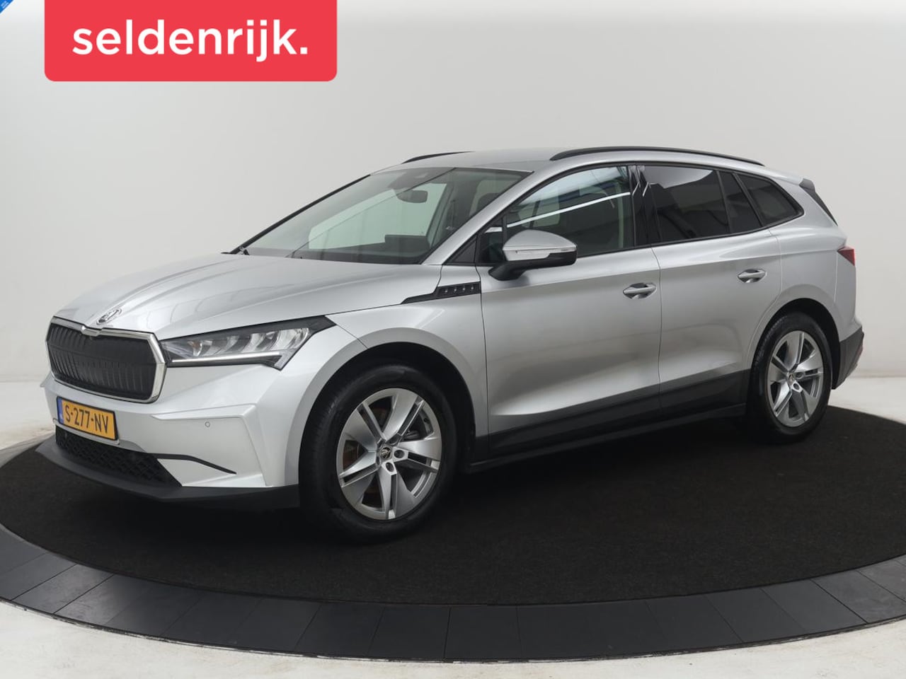 Skoda Enyaq iV - 60 SOH 91,2% | Adaptive cruise | Stuur/stoel verwarming | Trekhaak | Camera | Sfeerverlich - AutoWereld.nl