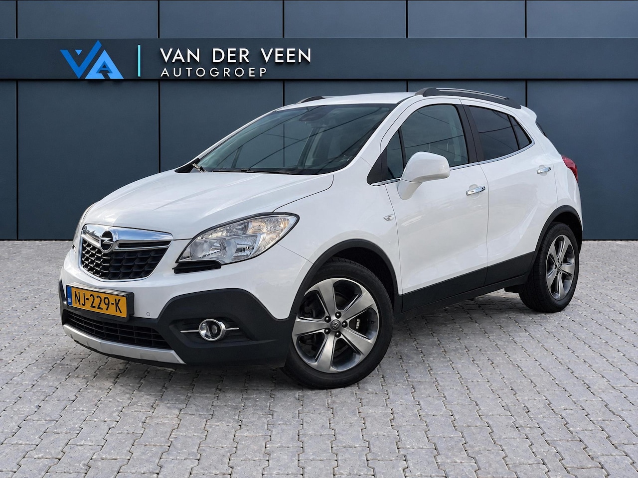 Opel Mokka - 1.4 T Cosmo | Trekhaak | Stoel/stuurverwarming | Parkeercamera | Navigatie | Bluetooth | 1 - AutoWereld.nl
