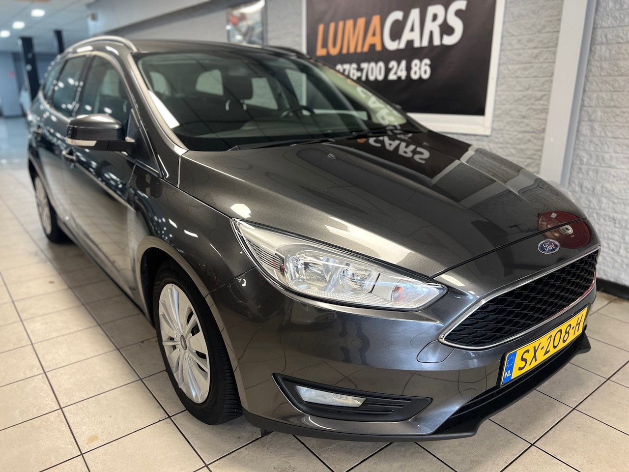 Ford Focus Wagon - 1.0 Titanium Edition | NW APK | Distri. V.V - AutoWereld.nl